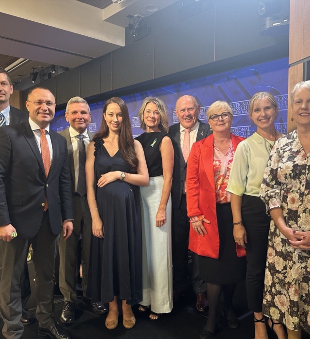 Vasyl Myroshnychenko , Senator Bilyk, Senator Reynolds, event moderator Chris Uhlmann, and members of the Ukrainian community